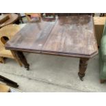 A LATE VICTORIAN WIND-OUT DINING TABLE ON TURNED AND FLUTED LEGS WITH CANTED CORNERS, 50X42" (TWO