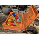 A COVERED SANDPIT AND ACCESSORIES