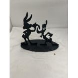 A WARNER BROS STORE METAL SILHOUETTE OF BUGS BUNNY AND DAFFY DUCK HEIGHT 24CM
