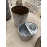 A GALVANISED BUCKET AND A MOP BUCKET