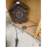 A VINTAGE WOODEN WALL CLOCK