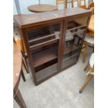 A MID 20TH CENTURY MAHOGANY TWO DOOR BOOKCASE, 36" WIDE