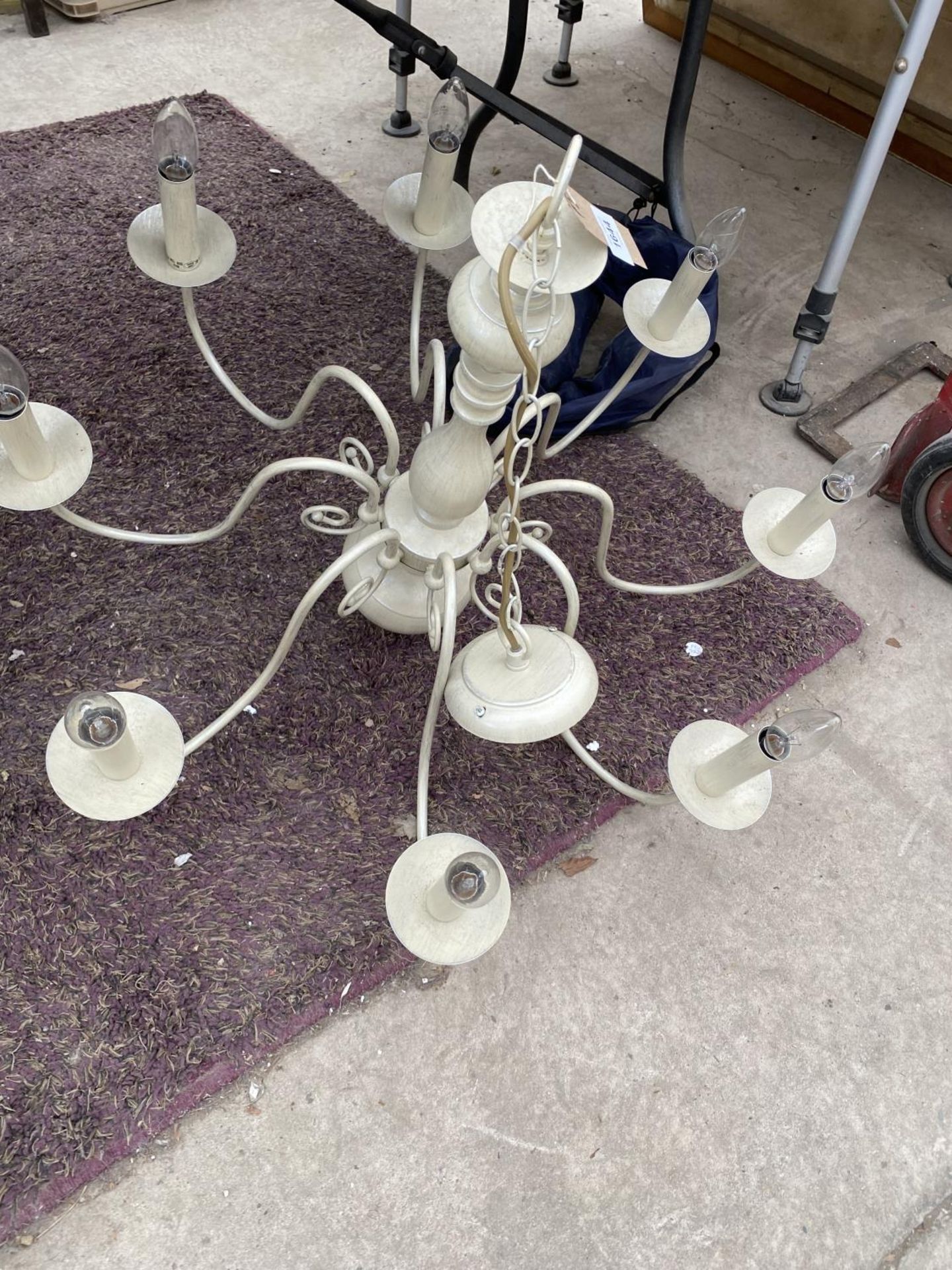 AN EIGHT BRANCH CEILING LIGHT FITTING