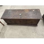 AN 18TH CENTURY STYLE HEAVILY CARVED OAK SWORD CHEST, 41" WIDE