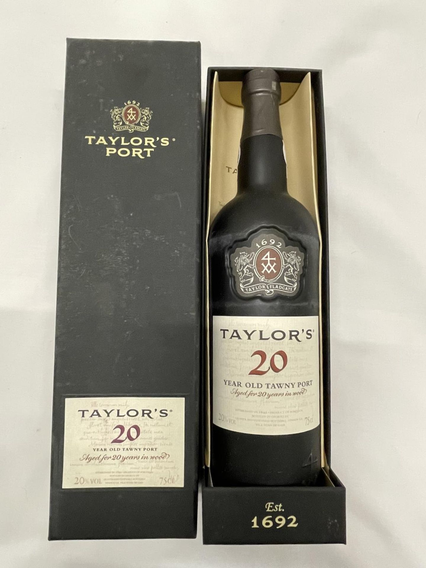 A BOXED 75CL TAYLORS 20 YEAR OLD TAWNY PORT AGED FOR 20 YEARS IN WOOD STORED IN A CONSTANT