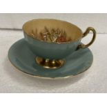AN AYNSLEY FINE ENGLISH BONE CHINA CABINET CUP AND SAUCER