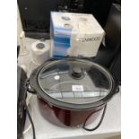 A KENWOOD JUICER AND A SLOW COOKER