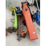 A FLYMO GARDEN VAC, TWO ELECTRIC GRASS STRIMMERS AND AN ELECTRIC HEDGE TRIMMER