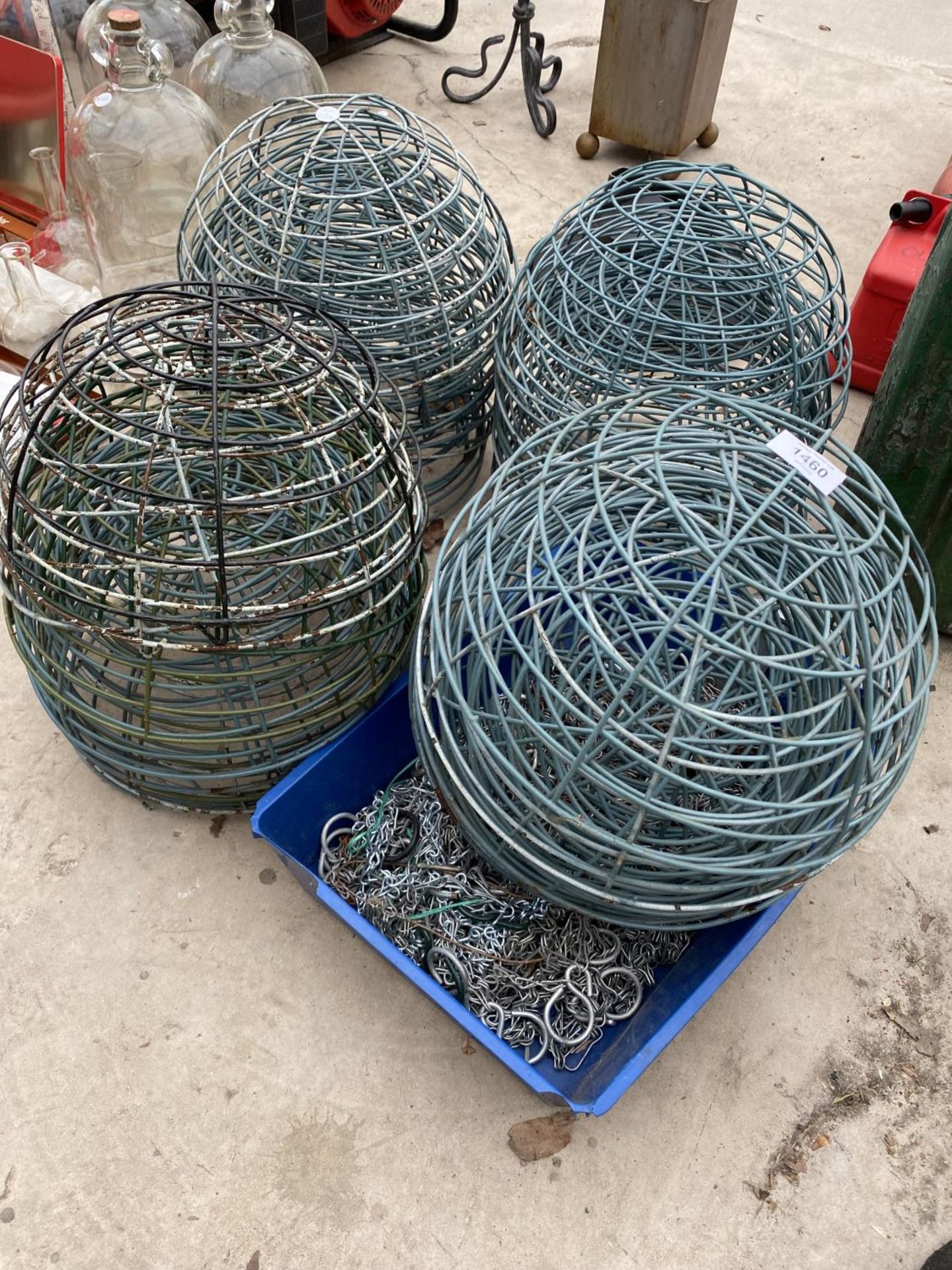 A LARGE COLLECTION OF METAL WIRE HANGING BASKETS WITH HANGING CHAINS