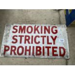 AN ENAMEL 'SMOKING STRICTLY PROHIBITED' SIGN