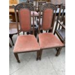 A PAIR OF MAHOGANY VICTORIAN DINING CHAIRS WITH CARVED TOP RAILS