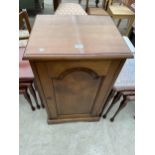 A VICTORIAN STYLE CABINET WITH PANELLED DOOR AND ADJUSTABLE SHELVES, 20" WIDE