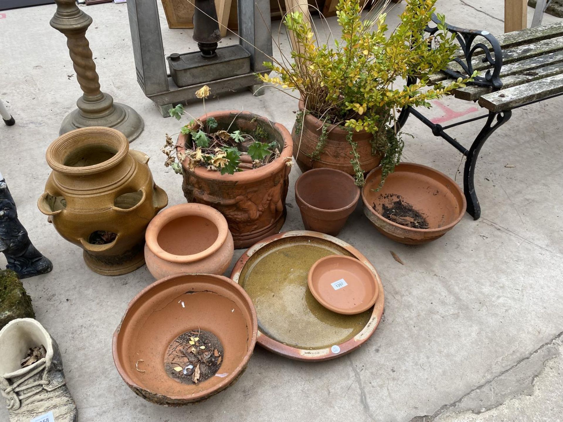 AN ASSORTMENT OF TERRACOTTA GARDEN PLANTERS