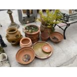 AN ASSORTMENT OF TERRACOTTA GARDEN PLANTERS