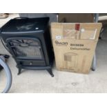 A SWAN DEHUMIDIFIER AND AN 1800W ELECTRIC HEATER