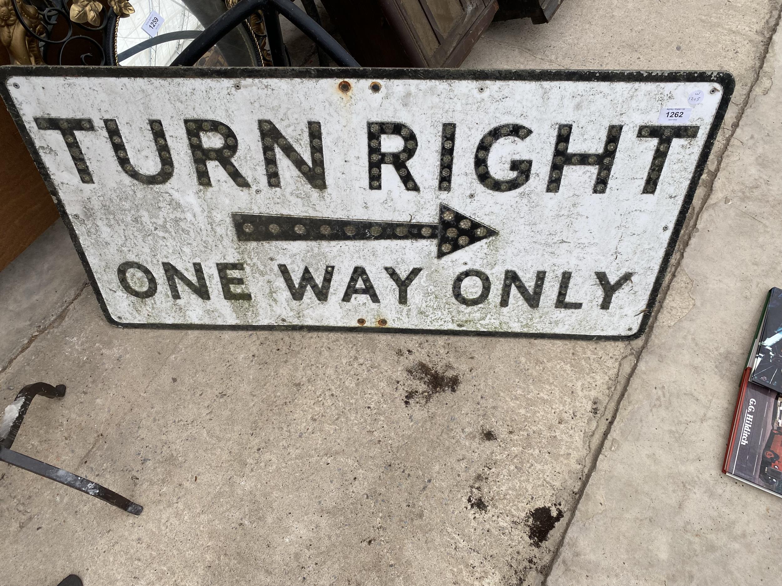 A VINTAGE 'TURN RIGHT ONE WAY ONLY' SIGN