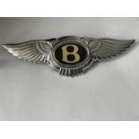 A BENTLEY CAR BADGE