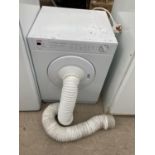 A WHITE CREDA COMPACT TUMBLE DRYER