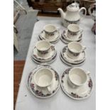 A ROYAL DOULTON 'AUTUMN'S GLORY' PART TEA SET TO INCLUDE TEAPOT, CUPS SAUCERS AND SIDE PLATES