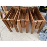 A SET OF THREE WOODEN TROUGH PLANTER HOLDERS