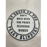 A CAST PEAKY BLINDERS SIGN DIAMETER 24CM