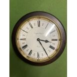 AN ENGLISH ELEGANCE WOODEN FRAMED CLOCK WITH ROMAN NUMERALS