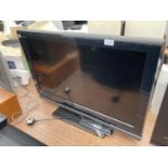 A SONY 32" TELEVISION WITH REMOTE CONTROL