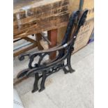 A PAIR OF DECORATIVE CAST IRON BENCH ENDS