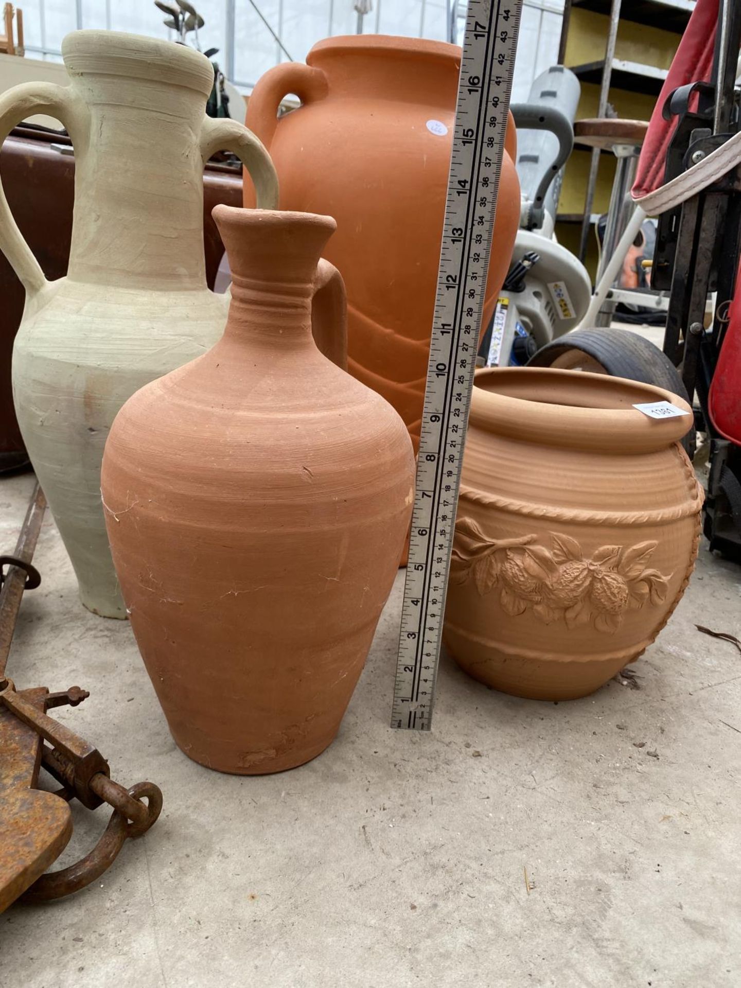 A TERRACOTTA PLANTER, A TERRACOTTA JUG AND TWO TERRACOTTA URNS - Image 4 of 4