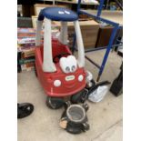 A RED AND WHITE LITTLE TIKES COZY COUPE CAR AND A METAL FRAME