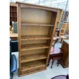 A MODERN PINE FIVE TIER OPEN BOOKCASE WITH DRAWER TO THE BASE, 34" WIDE