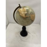 A WORLD GLOBE ON A WOODEN STAND HEIGHT 40CM