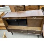 A RETRO G-PLAN E.GOMME SIDEBOARD ENCLOSING COCKTAIL SECTION, CUPBOARDS AND DRAWERS, 48" WIDE