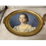 A VINTAGE PAPIER MACHE OVAL TRAY WITH A PORTRAIT OF A YOUNG GIRL 45CM X 33.5CM