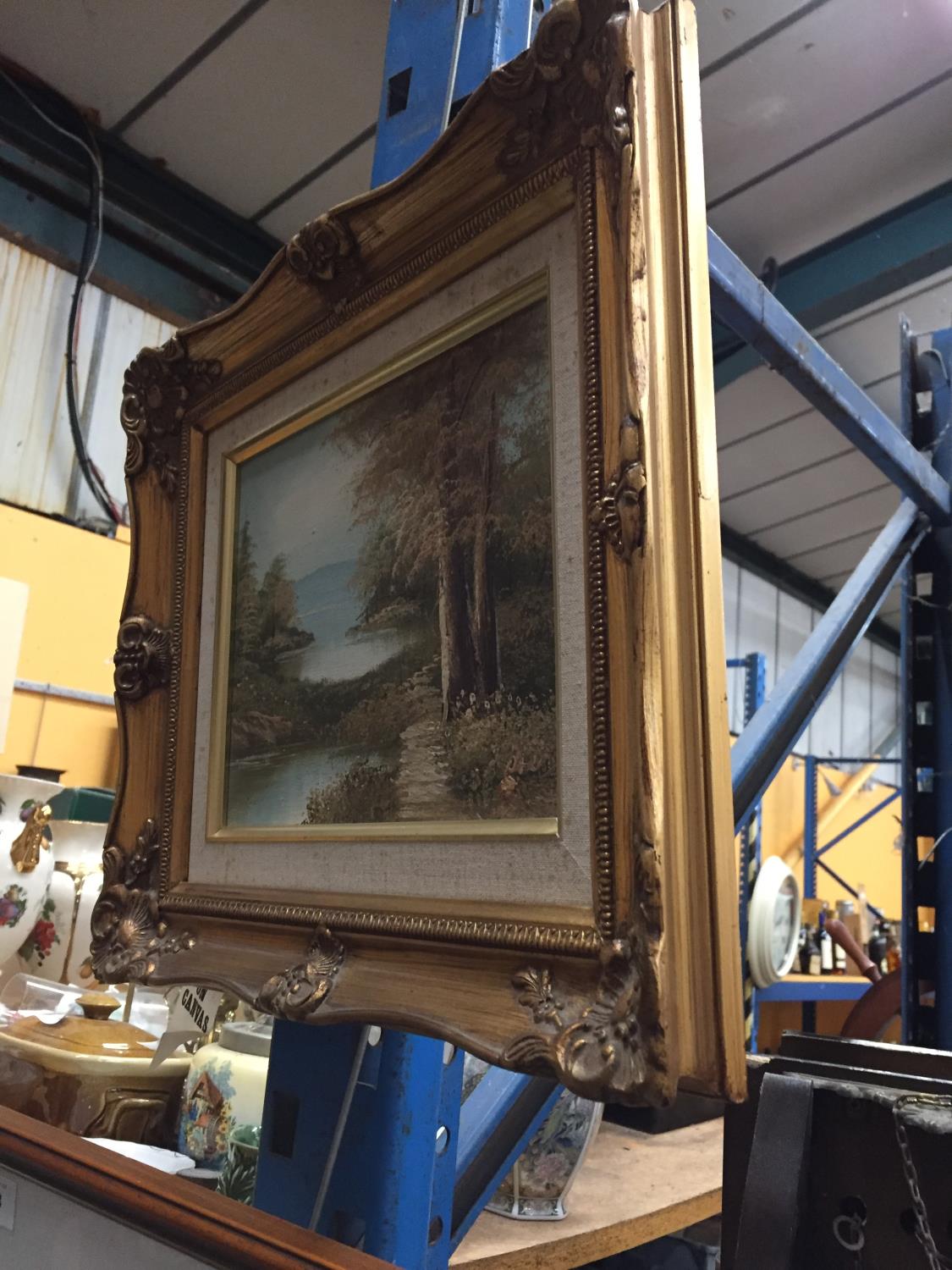 A GILT FRAMED OIL ON CANVAS OF A LAKE SCENE SET IN FORESTRY SIGNED DARBY W: 39CM - Image 4 of 4