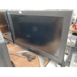 A TOSHIBA 32" TELEVISION WITH REMOTE CONTROL