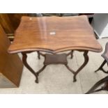 A LATE VICTORIAN MAHOGANY TWO TIER CENTRE TABLE, 27X19"