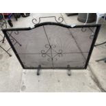 A METAL MESH FIRE SCREEN