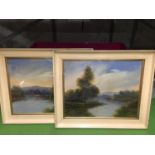 A PAIR OF FRAMED OIL PAINTINGS OF CATTLE IN A MOUNTAIN AND LAKE SCENE