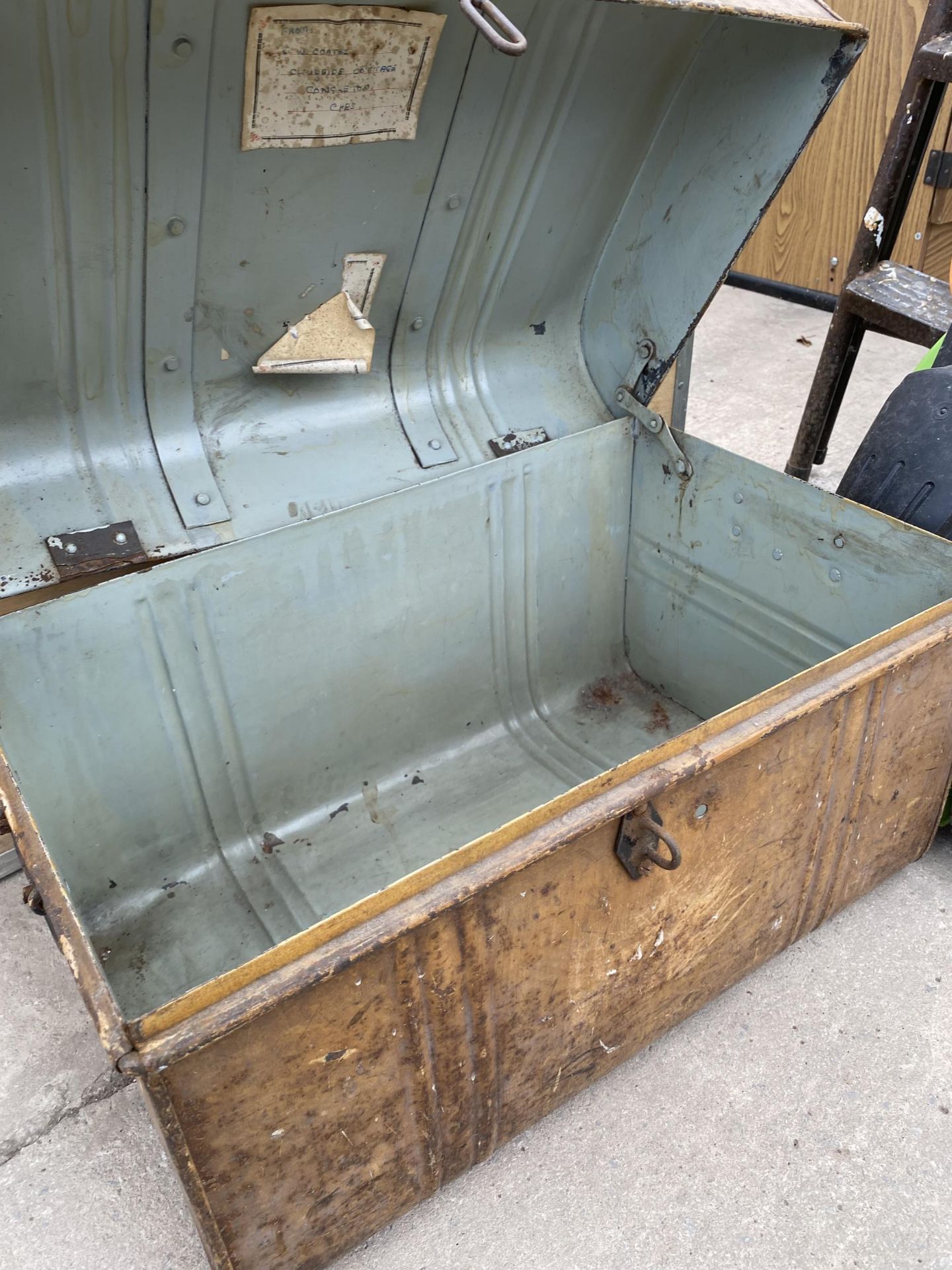 A WOODEN TRUNK CONTAINING WHEELS ETC, A TIN CHEST AND A NOISE SYSTEM KIT CASE - Image 4 of 5