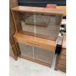 A RETRO TEAK AVALON BOOKCASE 33" WIDE WITH SLIDING GLASS DOORS