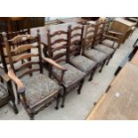 A SET OF SIX LADDERBACK DINING CHAIRS ON TURNED LEGS AND STRETCHERS