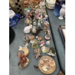 A LARGE QUANTITY OF CERAMIC FIGURES AND ANIMALS TO INCLUDE A LOMONOSOV SEAL, WADE TORTOISE,