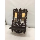 AN ORNATE VICTORIAN SMALL DOUBLE WALL MIRROR WITH SHELF