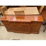 A MODERN YEW WOOD BREAKFRONT SIDEBOARD ENCLOSING FOUR CUPBOARDS TWO SHORT AND ONE LONG DRAWER, 64"