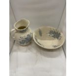 A LARGE CREAM AND BLUE STONEWARE WASH BOWL DIAMETER 36CM AND A MATCHING WATER JUG