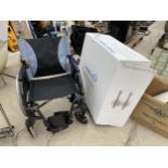 A WHEELFREEDOM FOLDING WHEELCHAIR