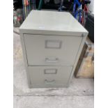 A TWO DRAWER METAL FILING CABINET