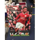 A LARGE WALL CANVAS OF CRISTIANO RONALDO PLAYING FOR MANCHESTER UNITED H: 92 CM