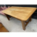 A MODERN OAK REFECTORY STYLE DINING TABLE ON STRAIGIHT LEGS AND STRETCHERS, 71X35.5"